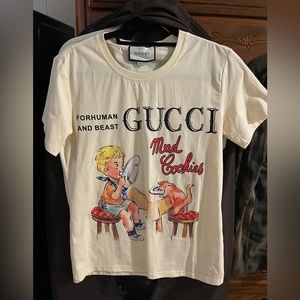 Women’s Gucci mad cookies shirt. It is authentic. Never worn/ brand new.